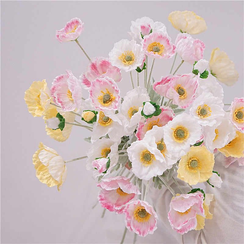 Faux white poppy stems minimalist wedding floral arrangement decor